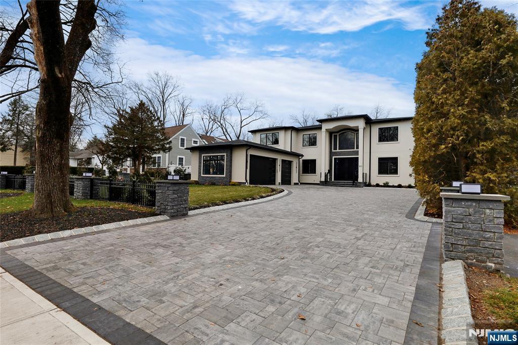 311 North Farview Avenue Paramus, NJ 07652 - Photo 1 of 50 front view of a house with a yard