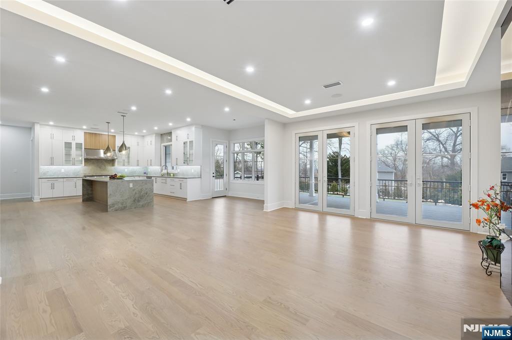 311 North Farview Avenue Paramus, NJ 07652 - Photo 12 of 50 a view of a kitchen with large windows and furniture
