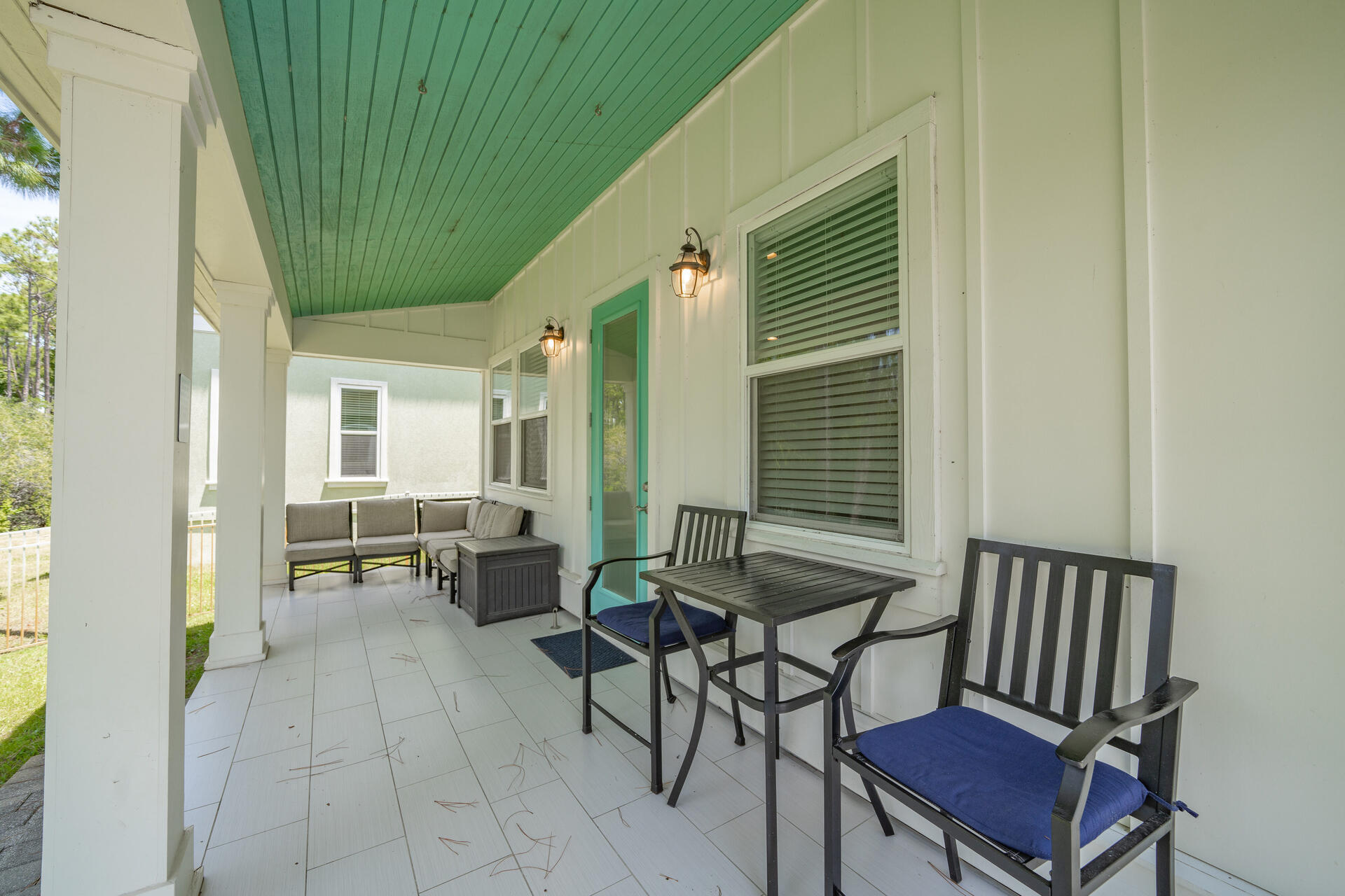 23 Mobile Street Miramar Beach, FL 32550 - Photo 34 of 49 a balcony with chairs and a potted plant