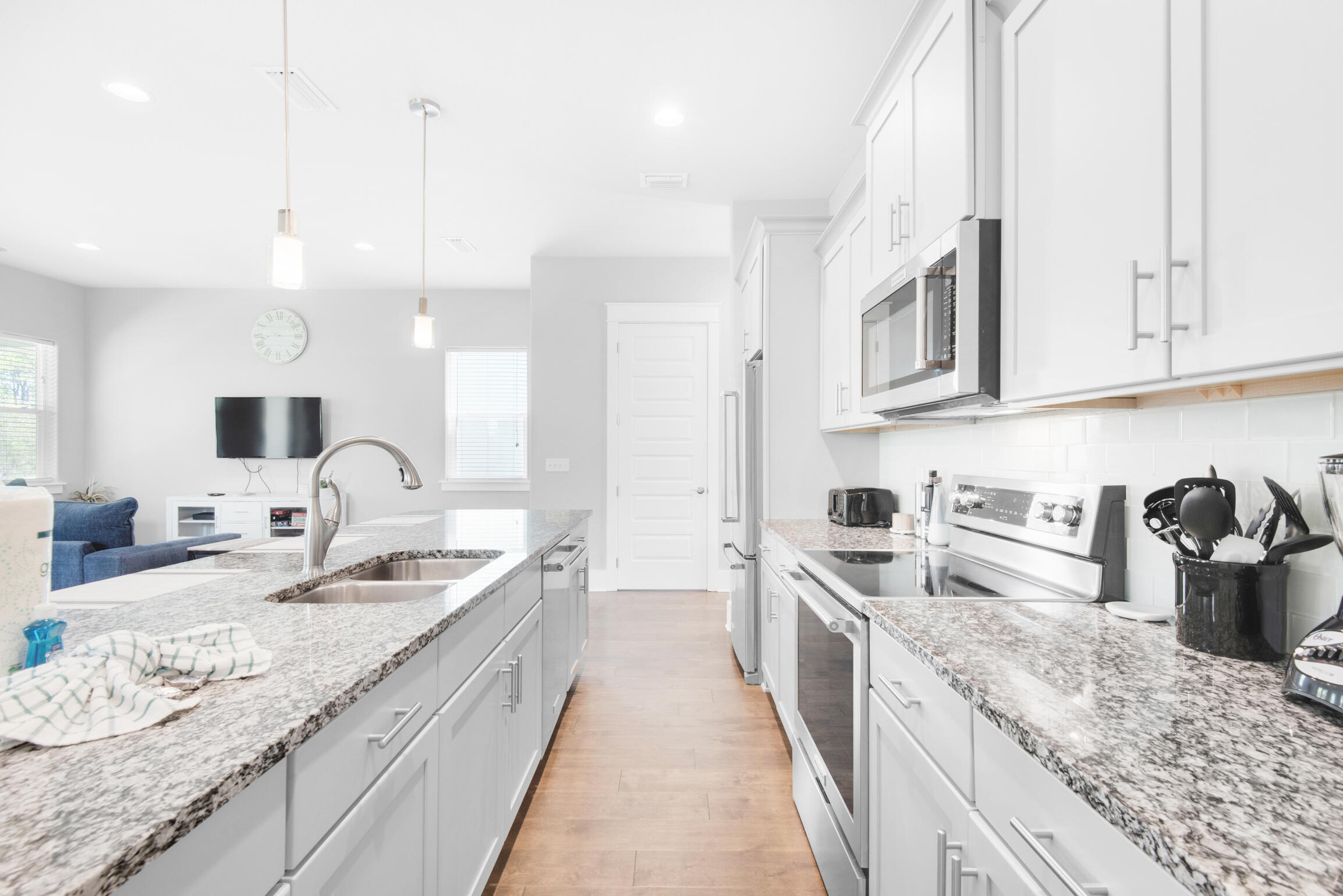 23 Mobile Street Miramar Beach, FL 32550 - Photo 9 of 49 a large kitchen with stainless steel appliances granite countertop a sink stove and cabinets