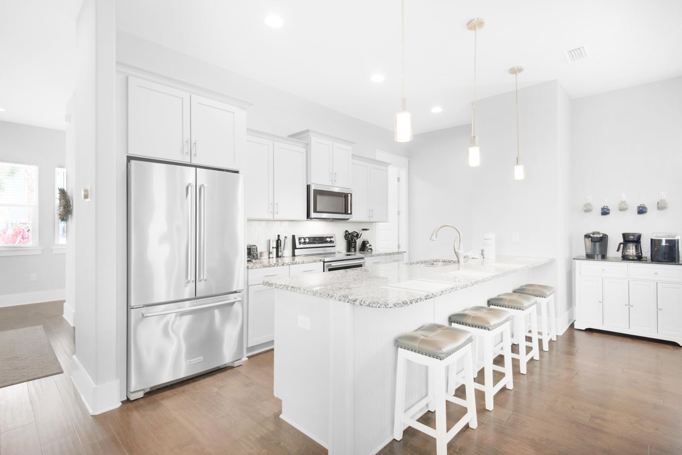 23 Mobile Street Miramar Beach, FL 32550 - Photo 10 of 49 a kitchen with stainless steel appliances granite countertop a refrigerator and a stove top oven