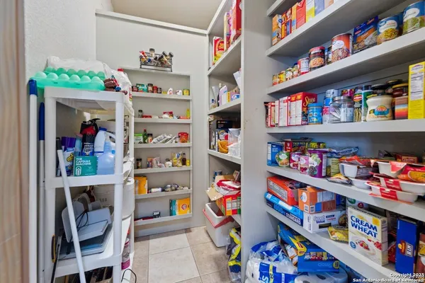 a room with toys and a book shelf