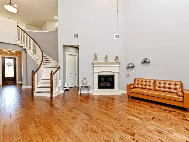 a view of a livingroom with furniture and a fireplace
