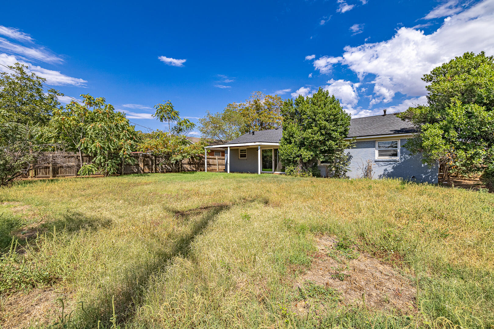 5403 13th Street Lubbock, TX 79416 - Photo 27 of 28 a view of a house with a yard