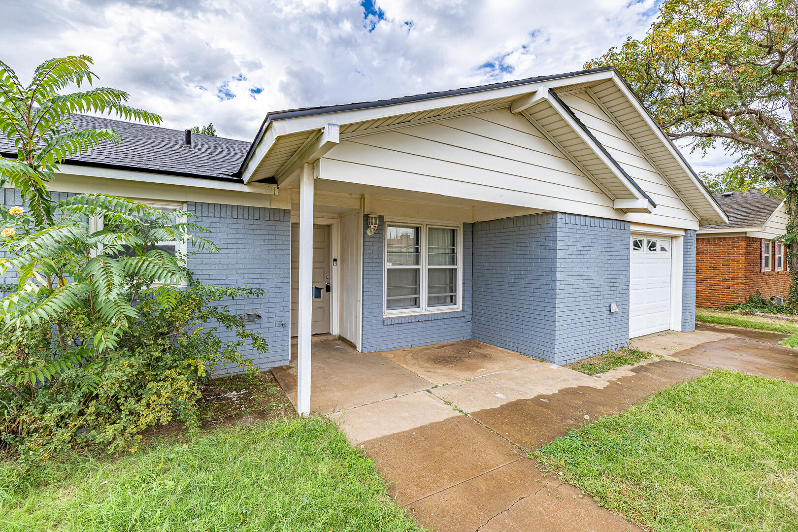 5403 13th Street Lubbock, TX 79416 - Photo 3 of 28 a view of a house with a yard