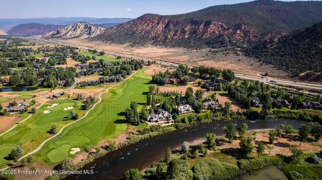 a view of a houses with a yard