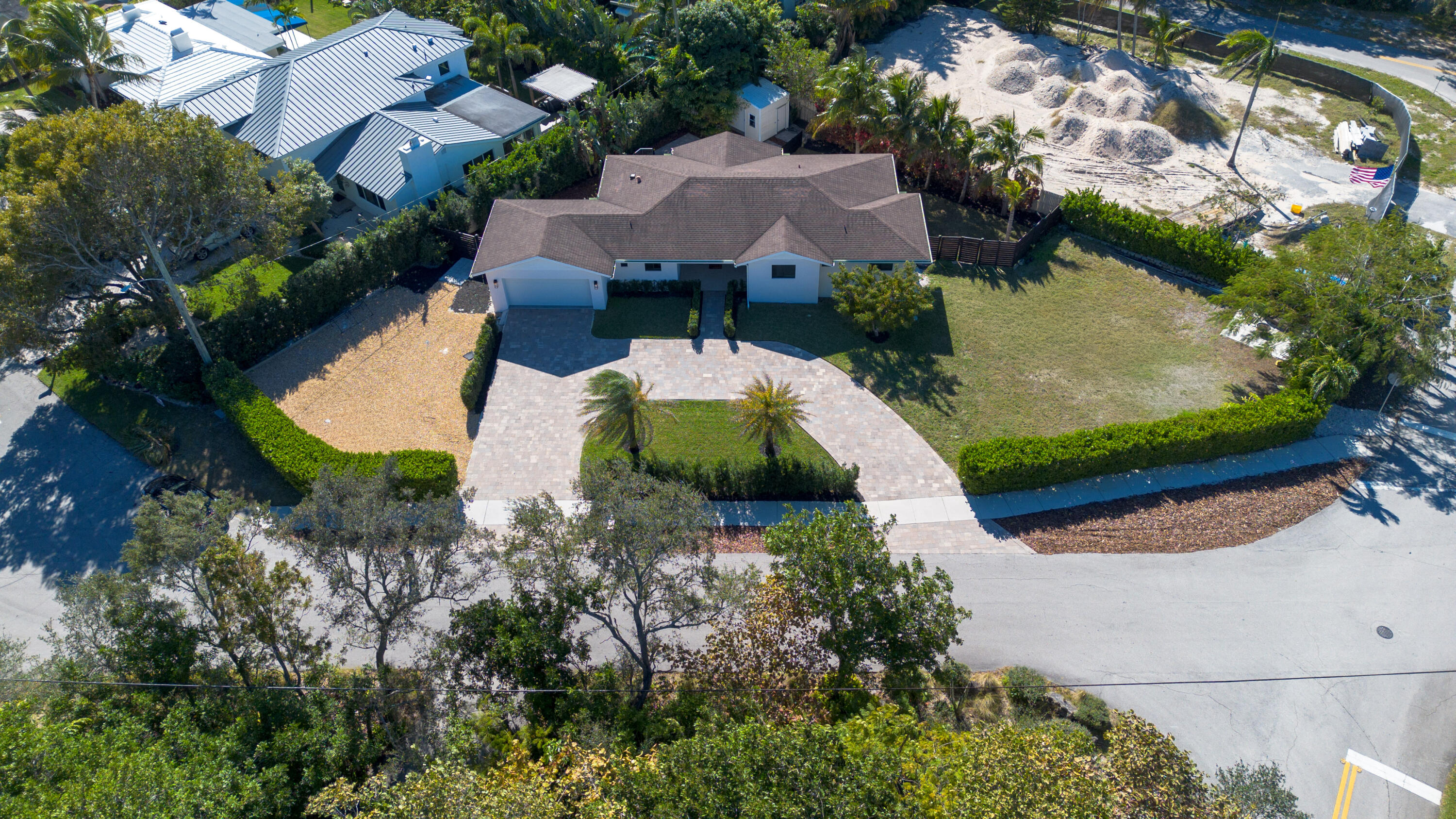 501 High Street Boca Raton, FL 33432 - Photo 23 of 27 an aerial view of a house with a garden and swimming pool