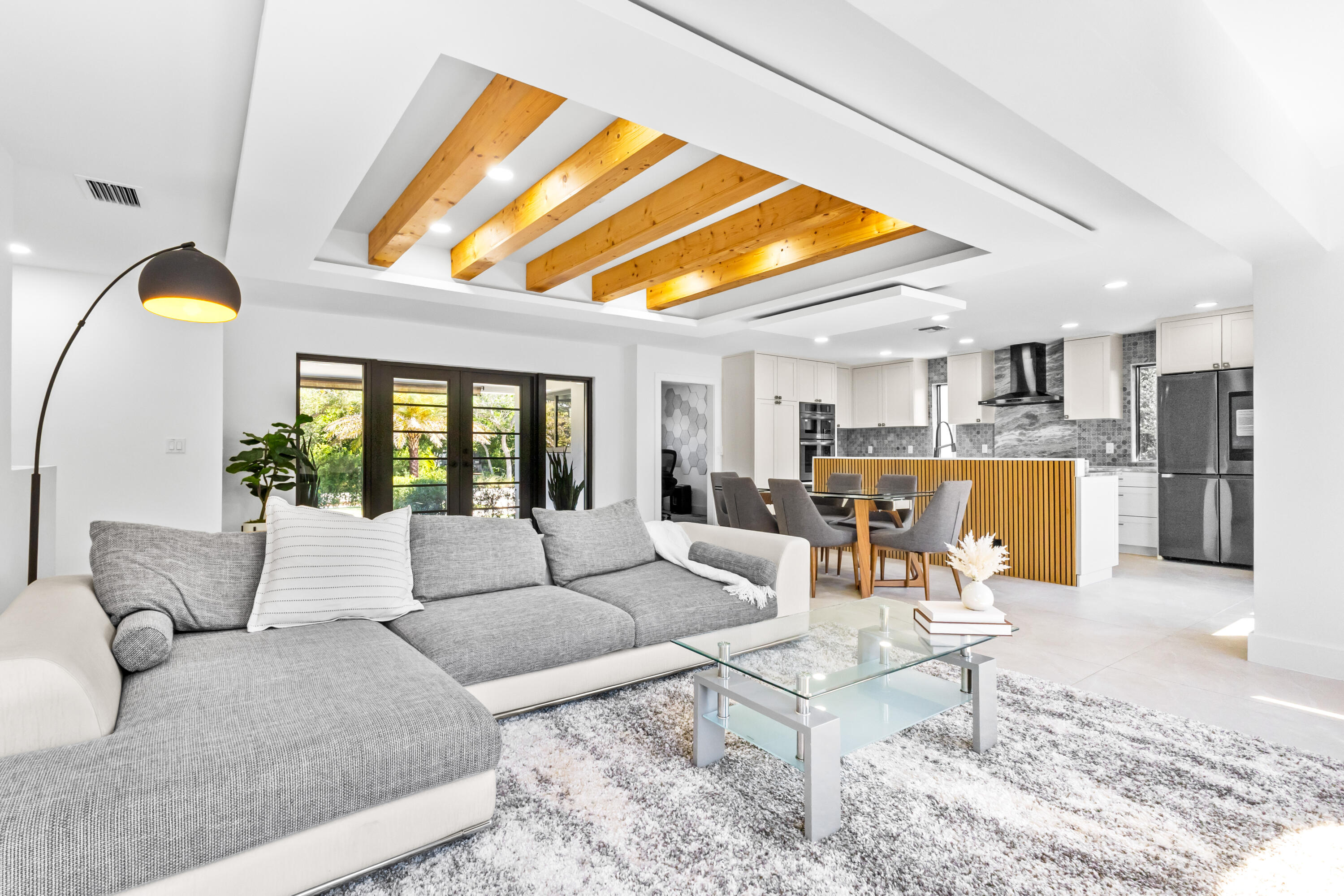501 High Street Boca Raton, FL 33432 - Photo 5 of 27 a living room with furniture and a large window