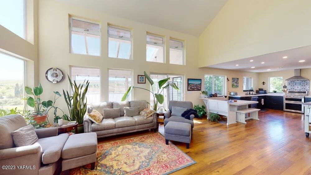14751 Cottonwood Canyon Road Yakima, WA 98908 - Photo 1 of 53 a living room with furniture fireplace and a table