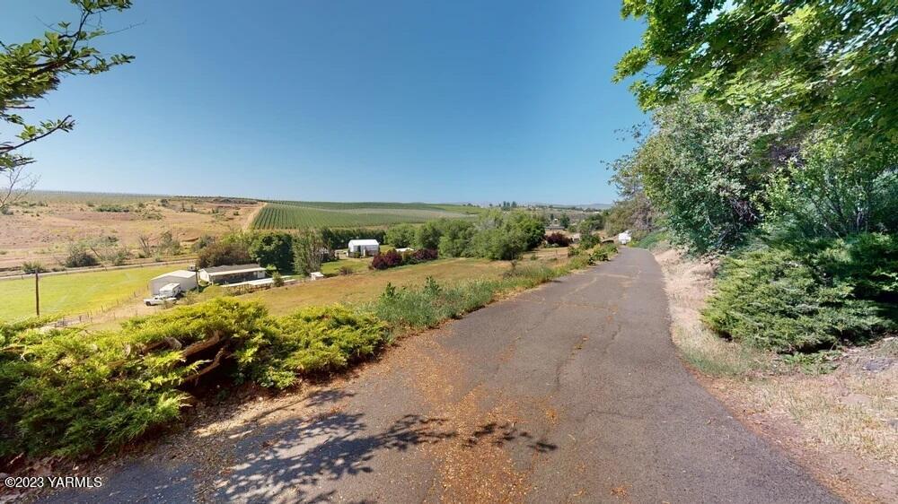 14751 Cottonwood Canyon Road Yakima, WA 98908 - Photo 43 of 53 a view of a pathway with a lake