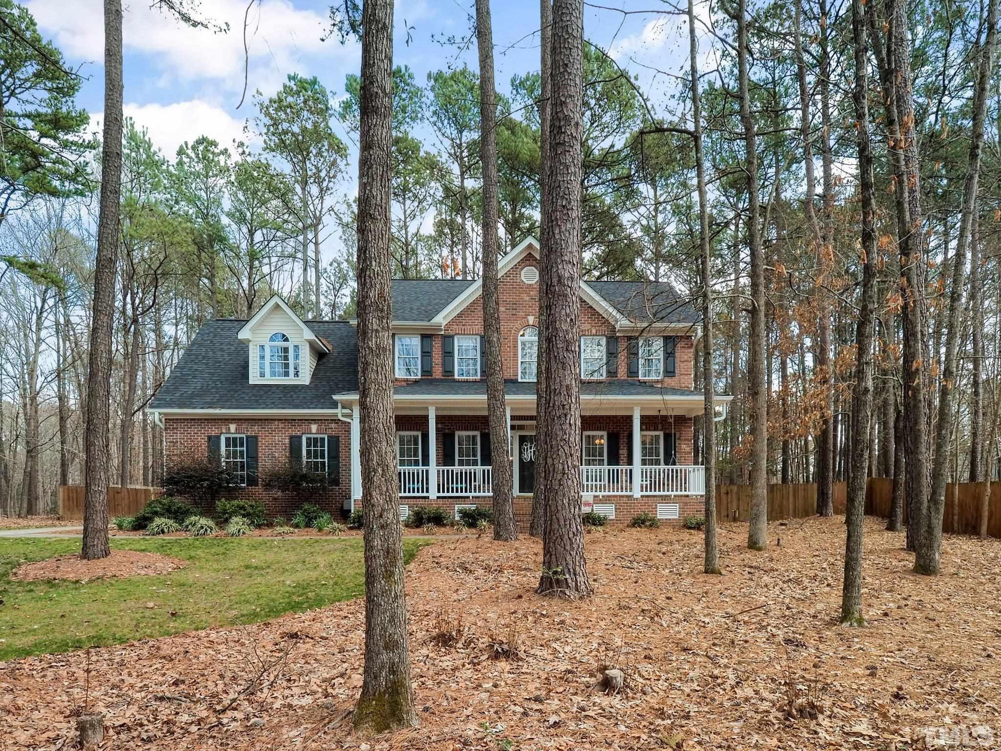 4412 Black Lion Way Raleigh, NC 27610 - Photo 2 of 32 front view of a house with a yard