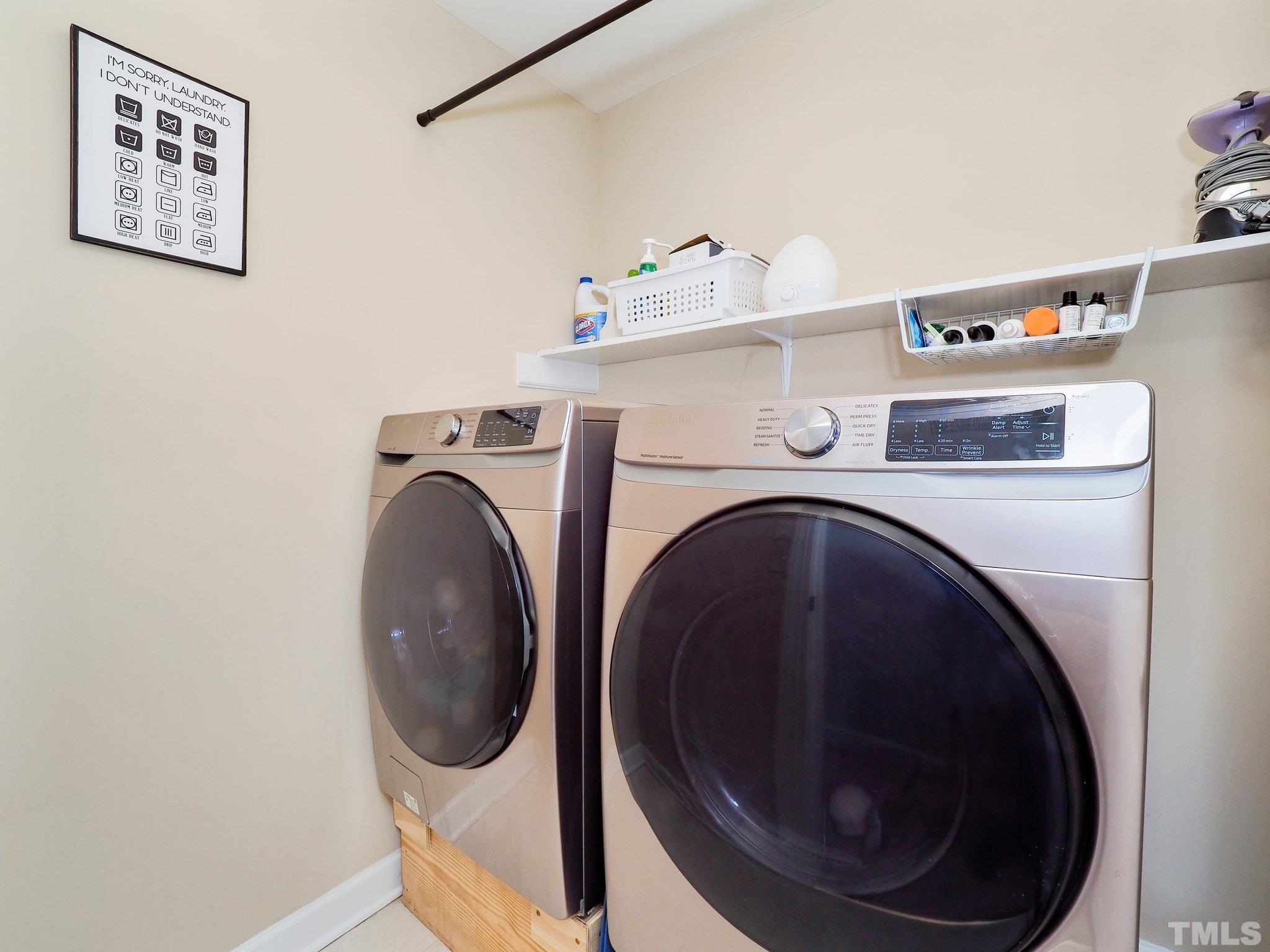 4412 Black Lion Way Raleigh, NC 27610 - Photo 25 of 32 a utility room with dryer and washer
