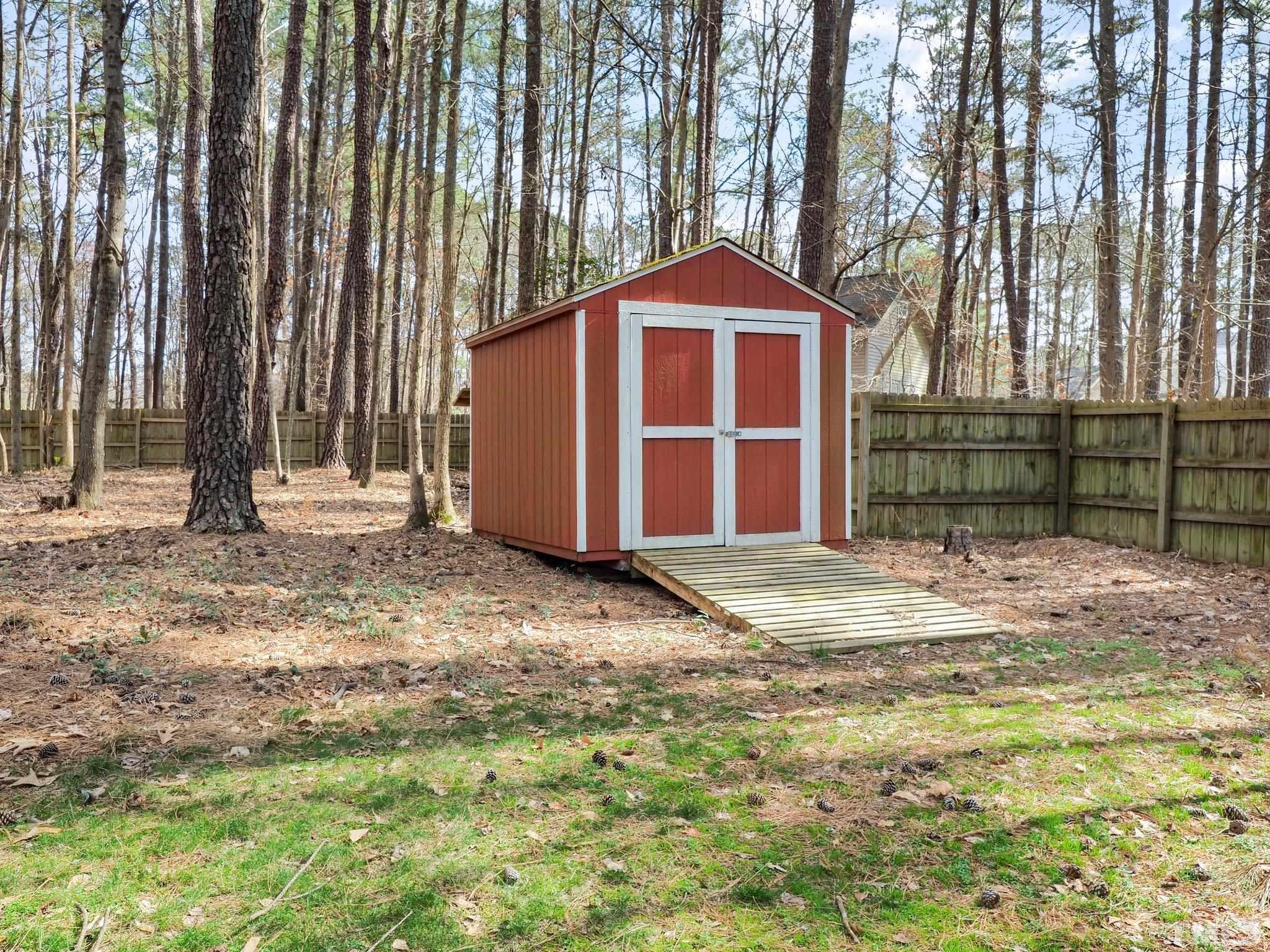 4412 Black Lion Way Raleigh, NC 27610 - Photo 30 of 32 a house view with a outdoor space