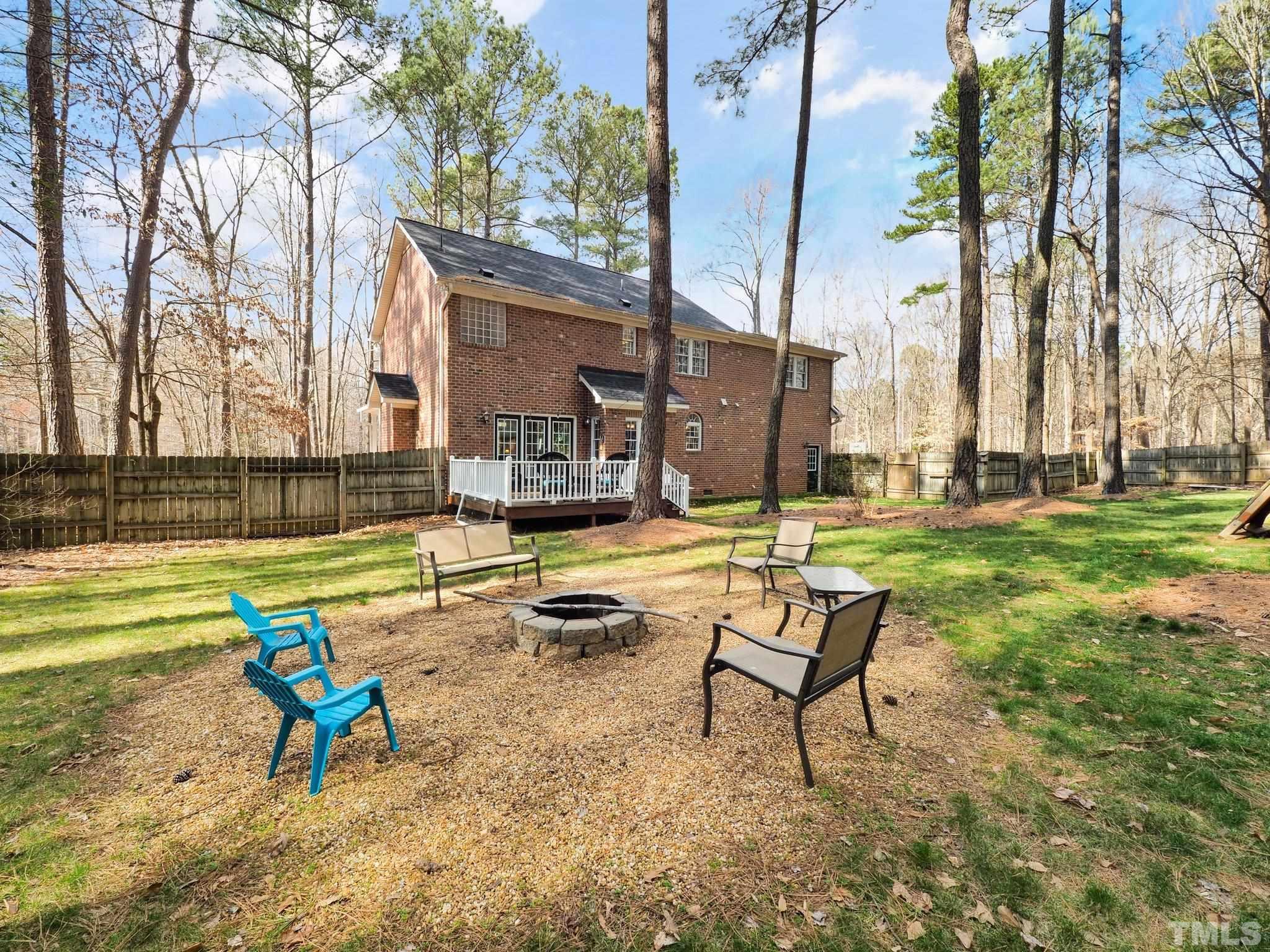 4412 Black Lion Way Raleigh, NC 27610 - Photo 31 of 32 a view of a park with a bench and bench