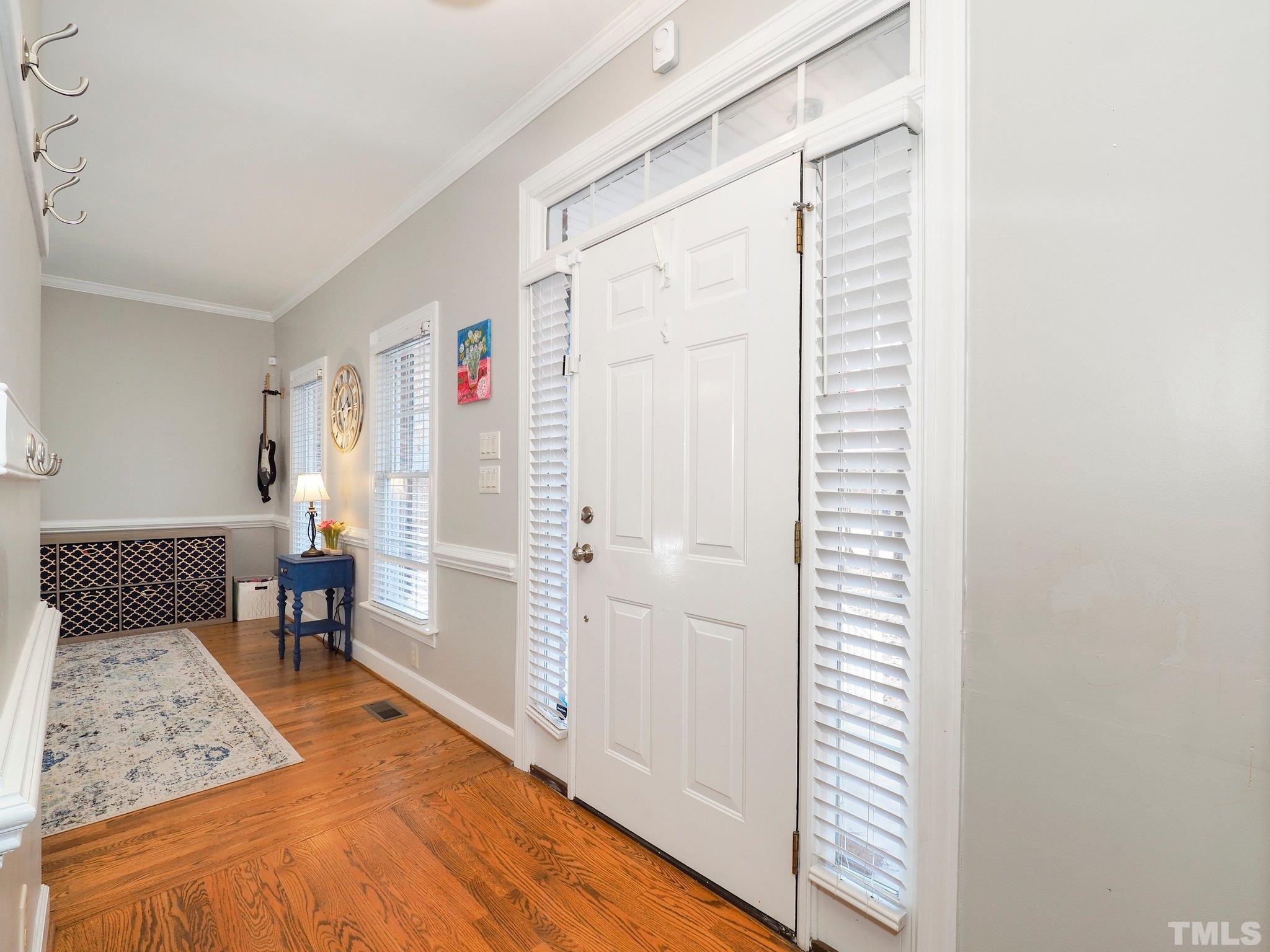 4412 Black Lion Way Raleigh, NC 27610 - Photo 8 of 32 a very nice looking room with a large window