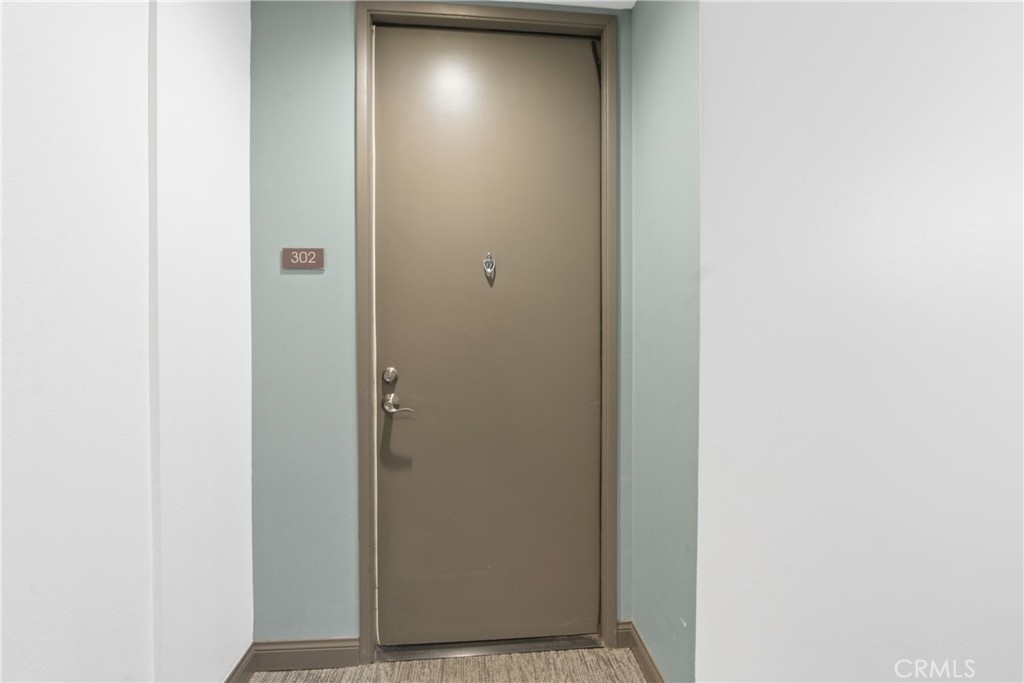 388 East Ocean Boulevard, Unit 302 Long Beach, CA 90802 - Photo 4 of 20 a view of a hallway
