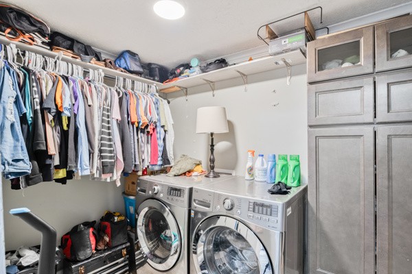 810 Fitzpatrick Road Culleoka, TN 38451 - Photo 13 of 13 a view of walk in closet with clothes and shoes