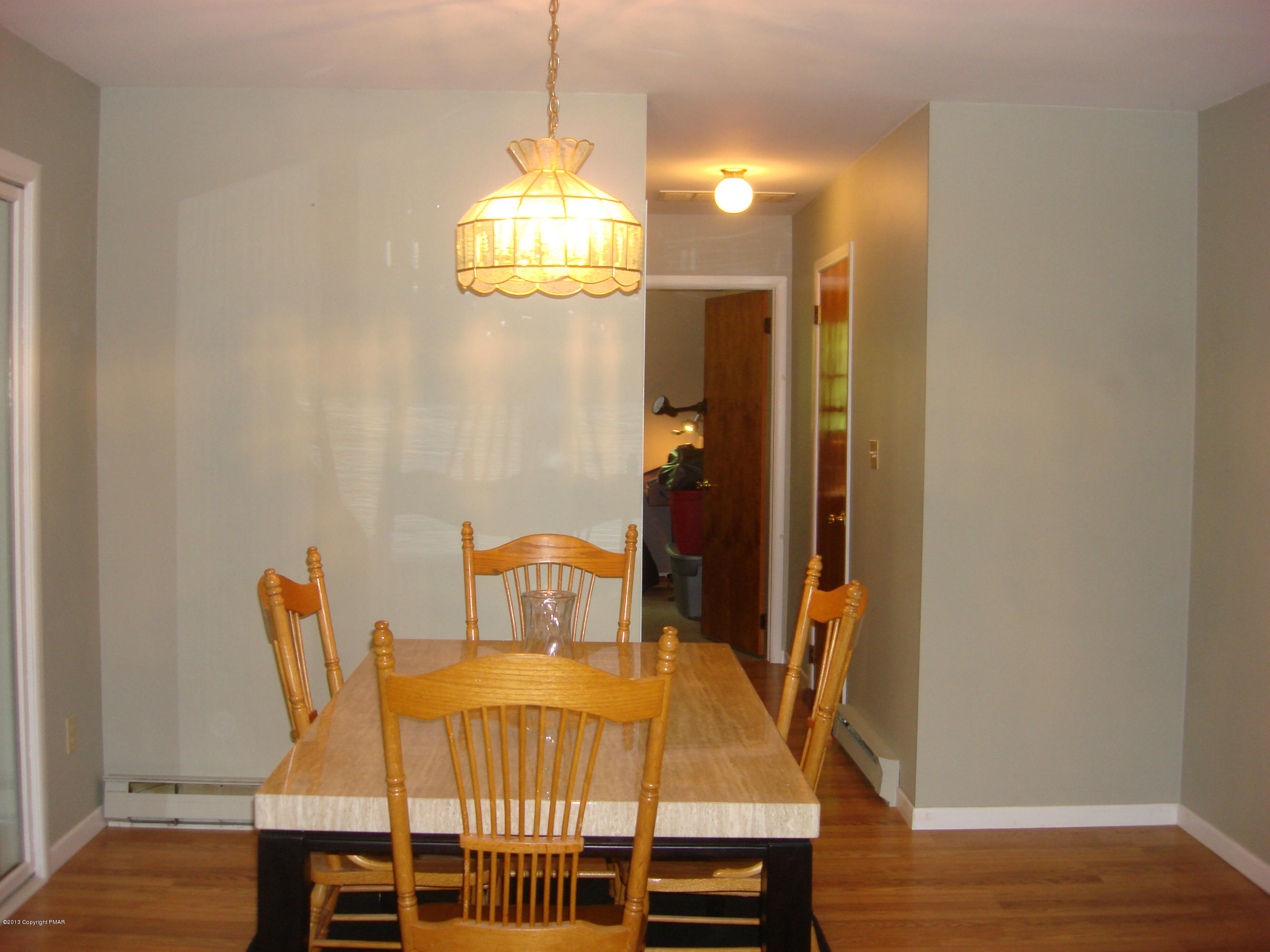 5 Laurelwood Road Swiftwater, PA 18370 - Photo 3 of 17 a view of a dining room with furniture and wooden floor