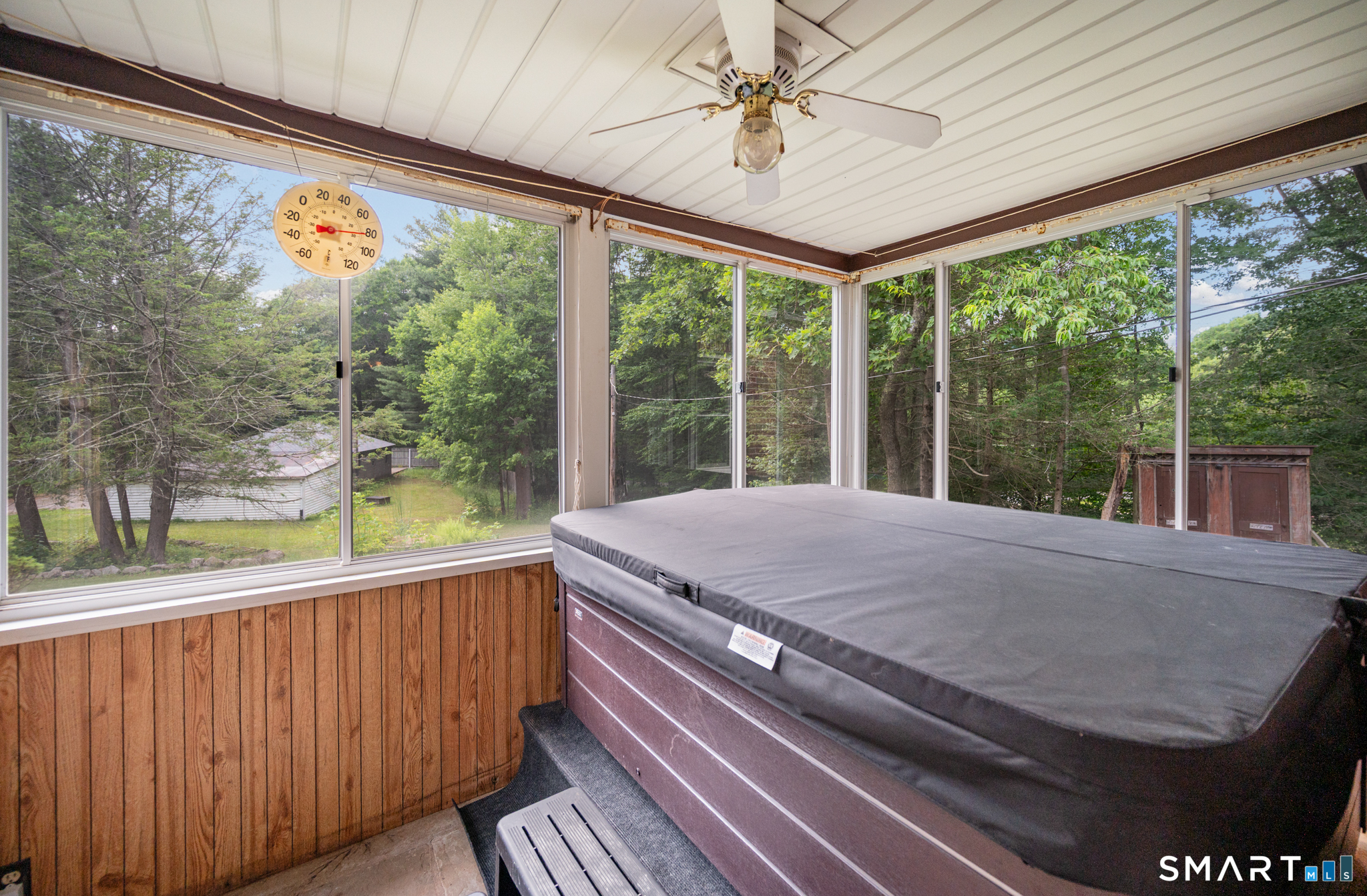 152 Ramstein Road New Hartford, CT 06057 - Photo 7 of 20 a bed sitting in a balcony next to a yard