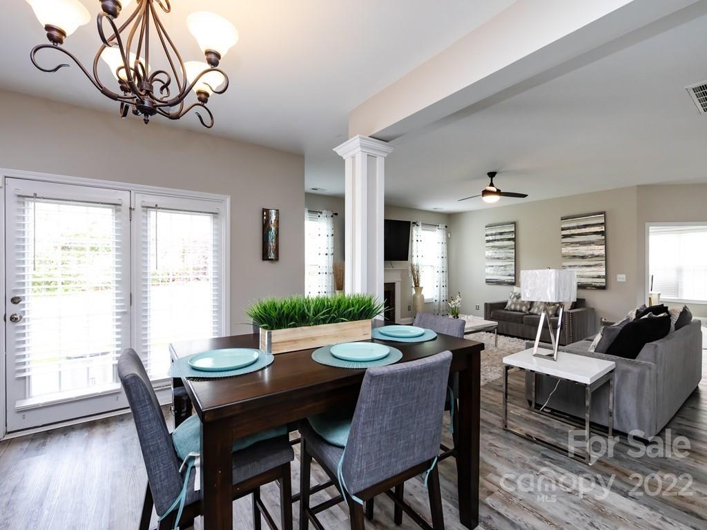 2721 Gosling Terrace Road Charlotte, NC 28262 - Photo 11 of 29 a view of a dining room with furniture window and wooden floor