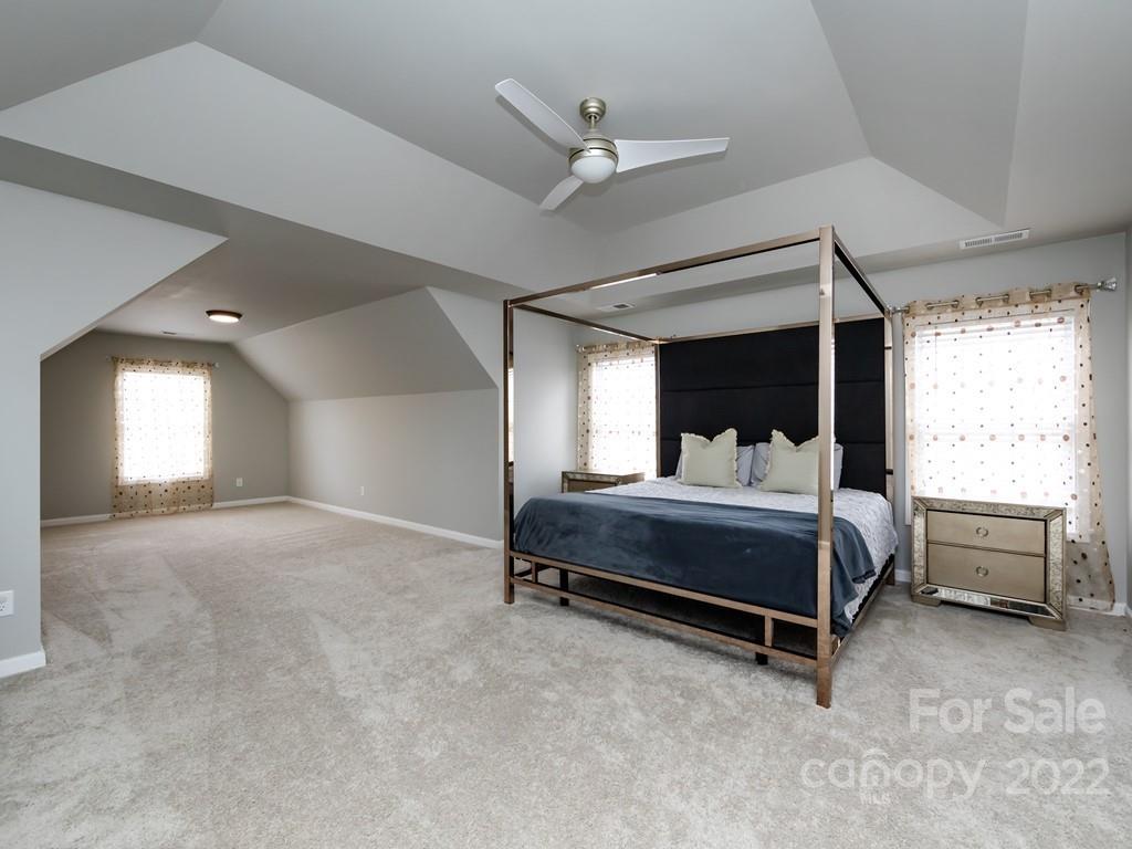 2721 Gosling Terrace Road Charlotte, NC 28262 - Photo 16 of 29 a bedroom with a bed and window