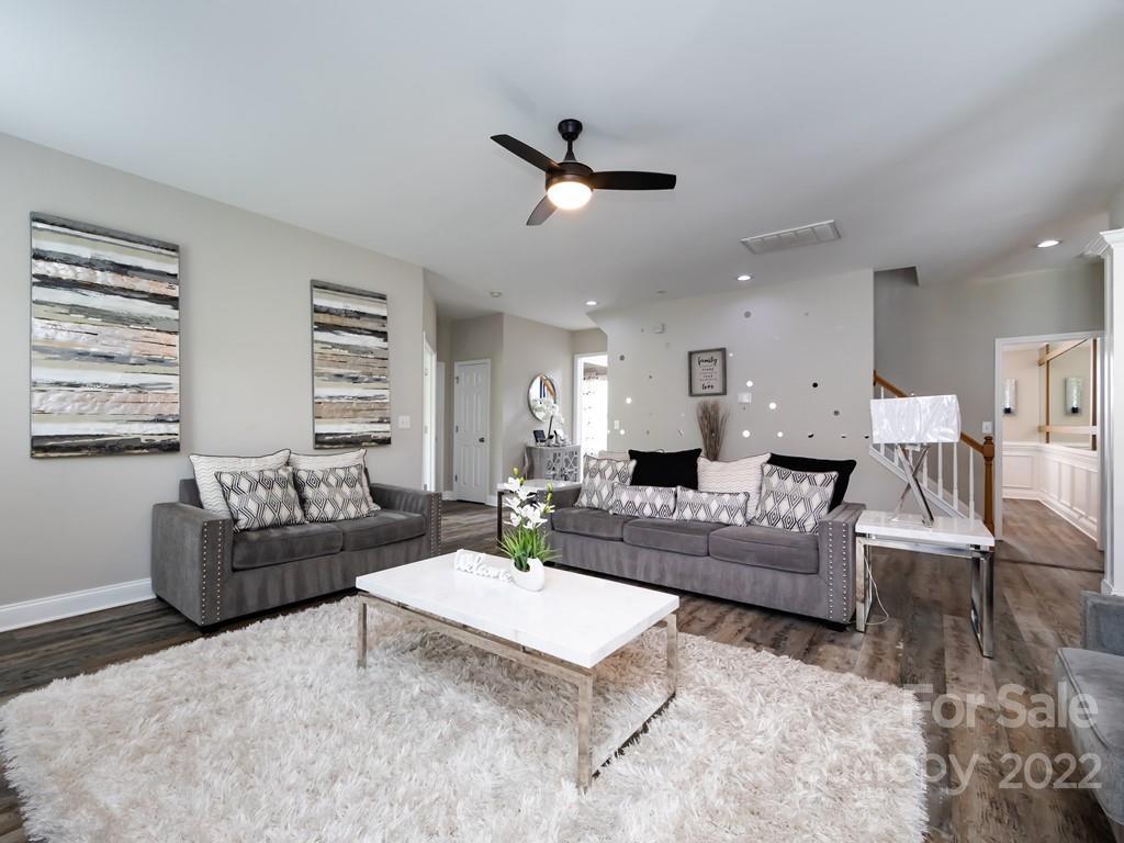 2721 Gosling Terrace Road Charlotte, NC 28262 - Photo 8 of 29 a living room with furniture and a large window