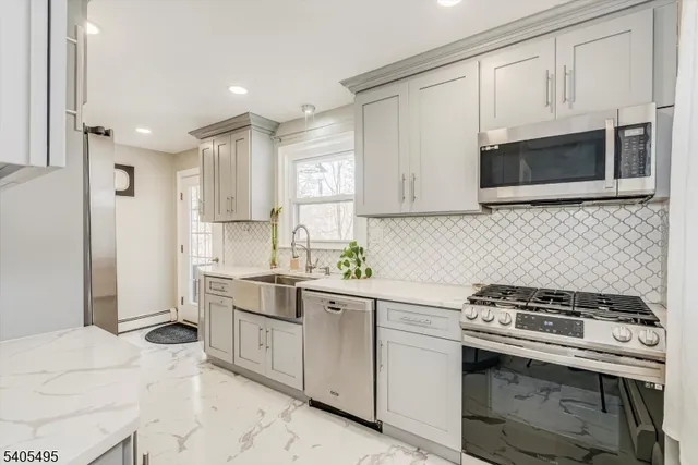 a view of room with furniture and a window