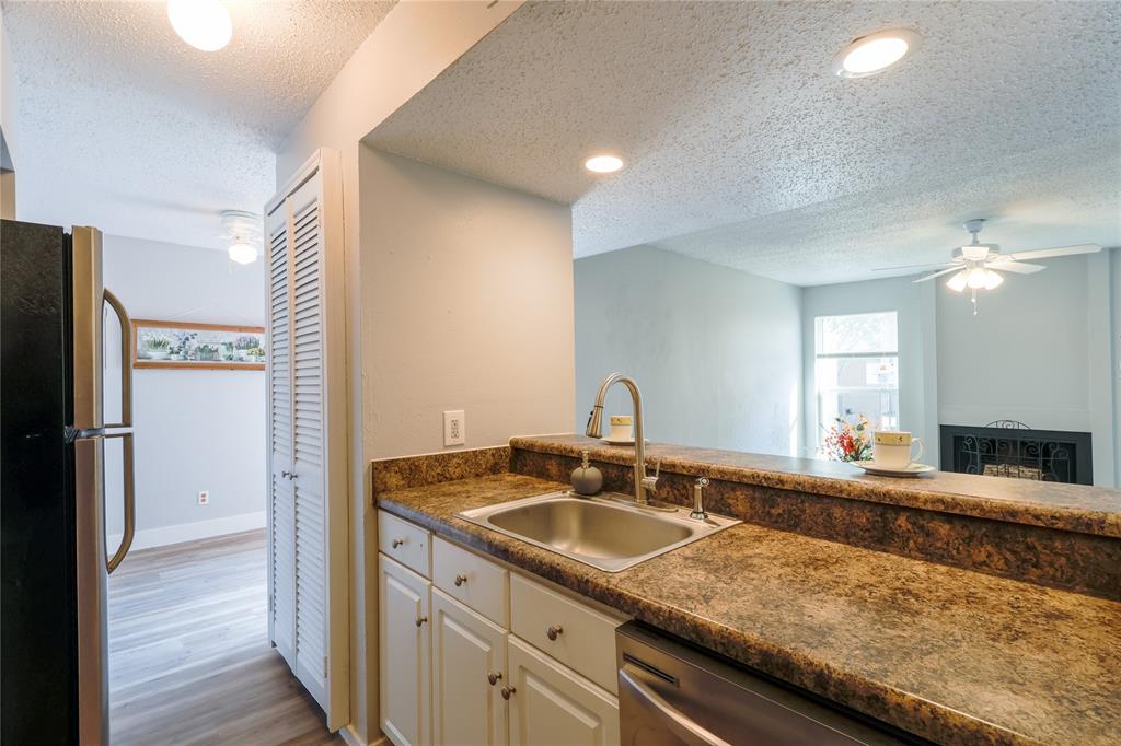 5522 Boca Raton Boulevard, Unit 404 Fort Worth, TX 76112 - Photo 7 of 13 Kitchen open to living and dining space