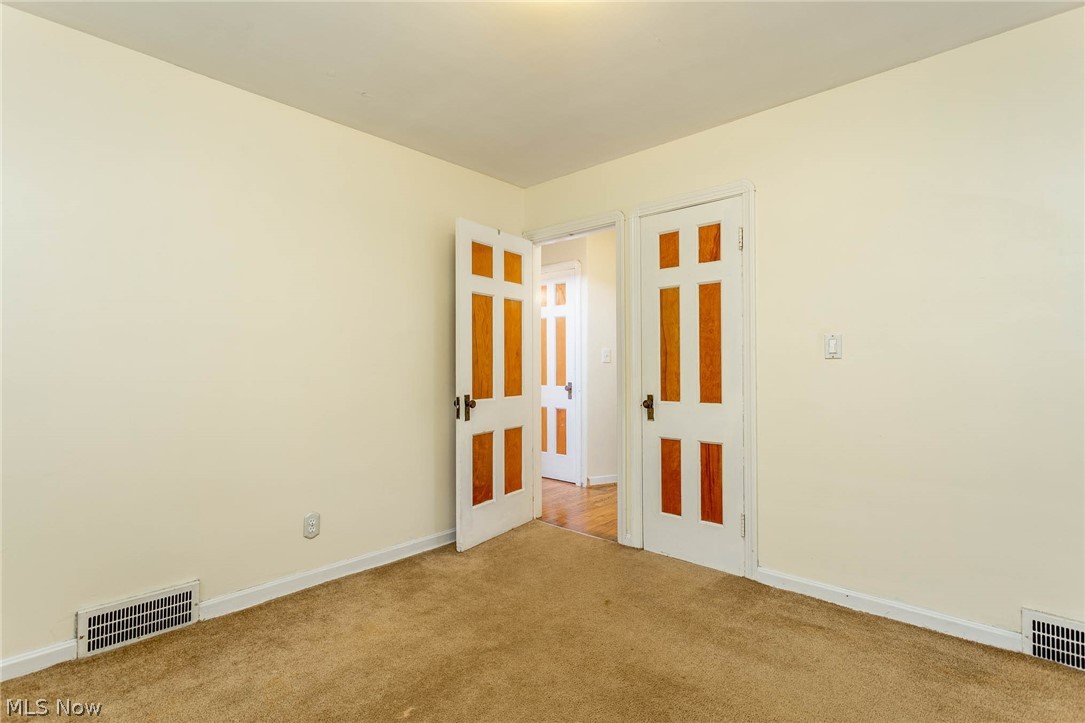 4611 Anderson Road Cleveland, OH 44121 - Photo 20 of 35 There are hardwood floors under the carpet of bedroom 3