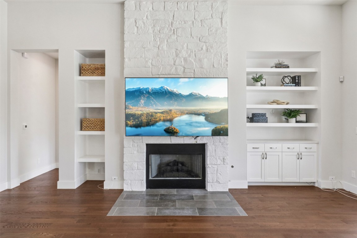 2404 Sailboat Pass Spicewood, TX 78669 - Photo 9 of 39 a view of a livingroom with furniture and a fireplace