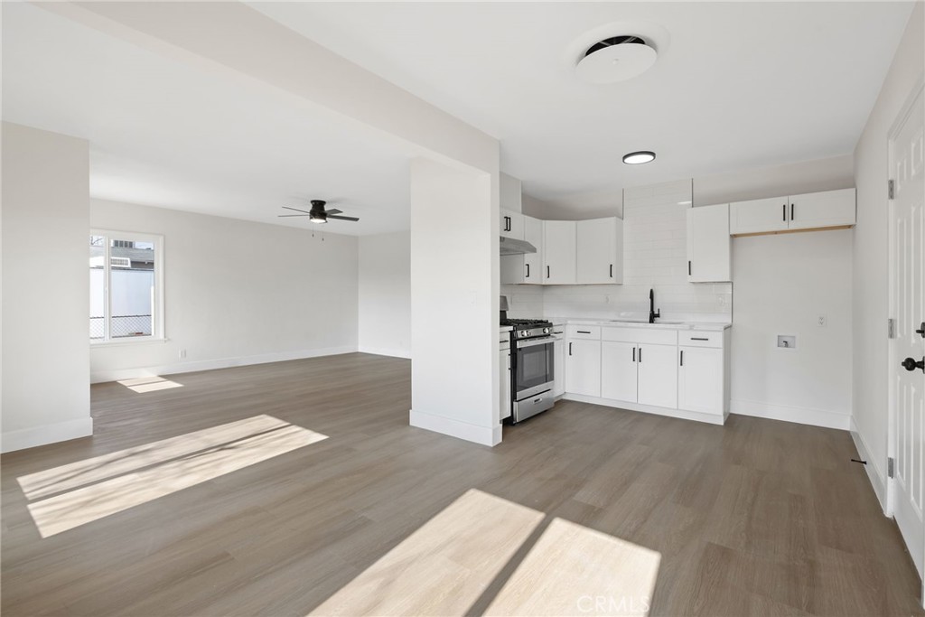 412 East Fairview Road Bakersfield, CA 93307 - Photo 12 of 28 a view of kitchen with wooden floor