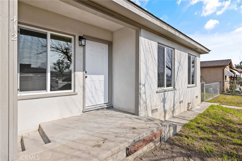 412 East Fairview Road Bakersfield, CA 93307 - Photo 5 of 28 a view of a front door of house