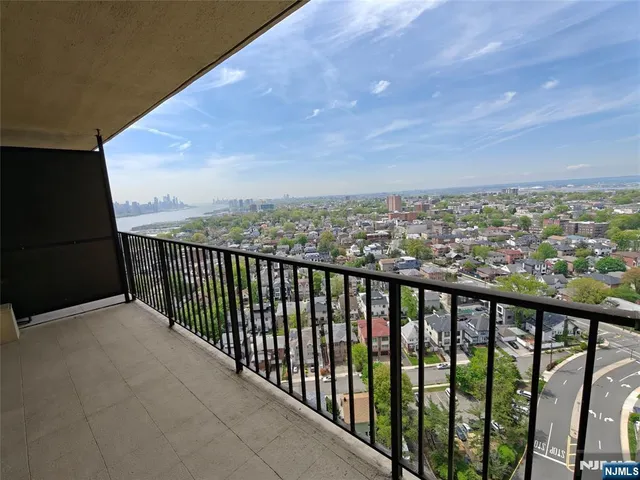 a balcony with city view