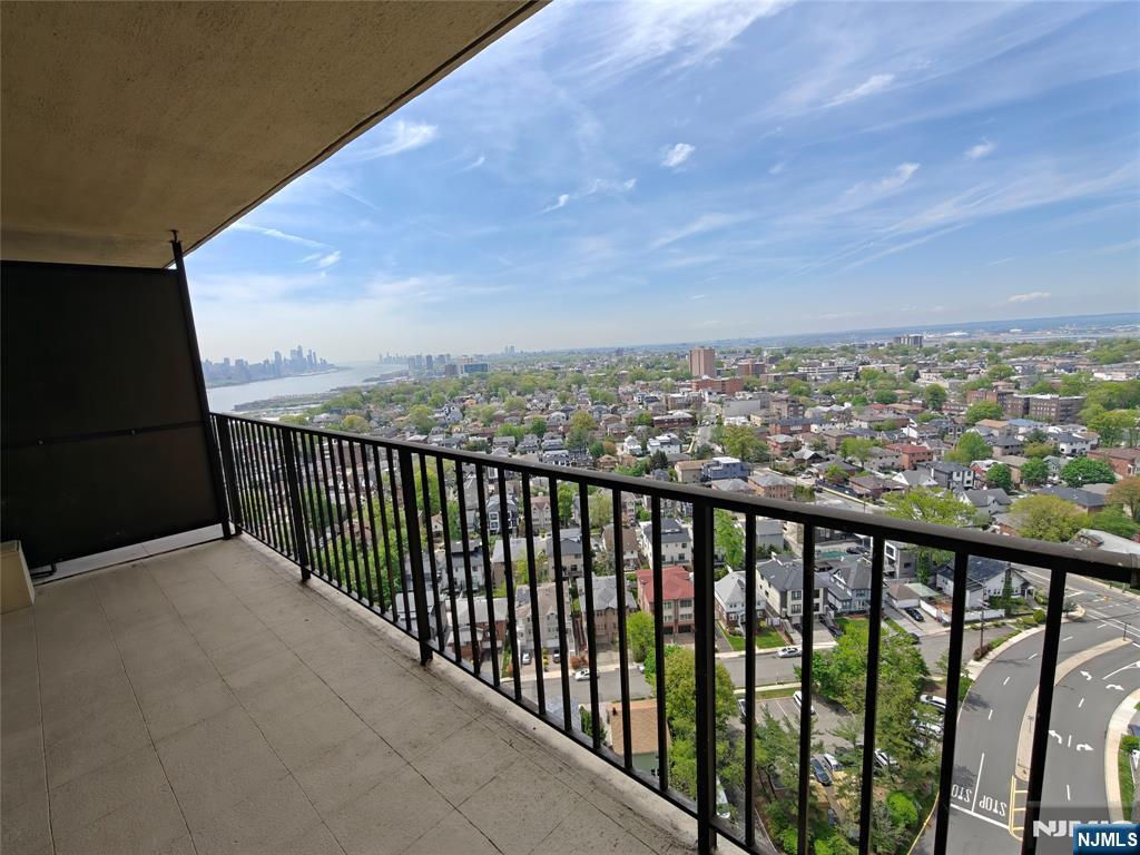 a balcony with city view