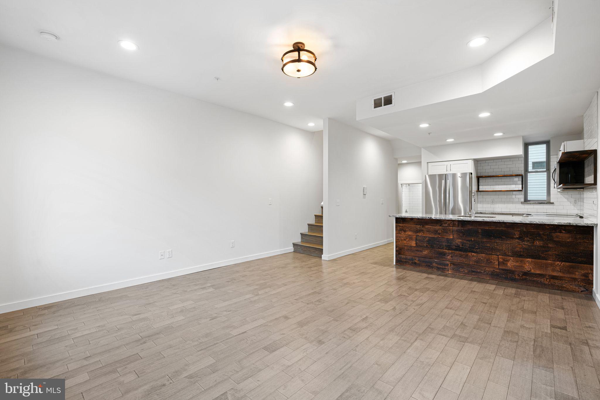1734 Wylie Street, Unit B Philadelphia, PA 19130 - Photo 5 of 36 view from living room to kitchen