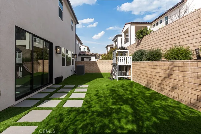 a view of a back yard of the house