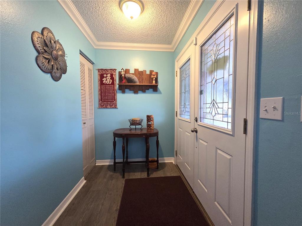 4059 Ligonier Road Spring Hill, FL 34608 - Photo 2 of 36 a view of a hallway with elevator