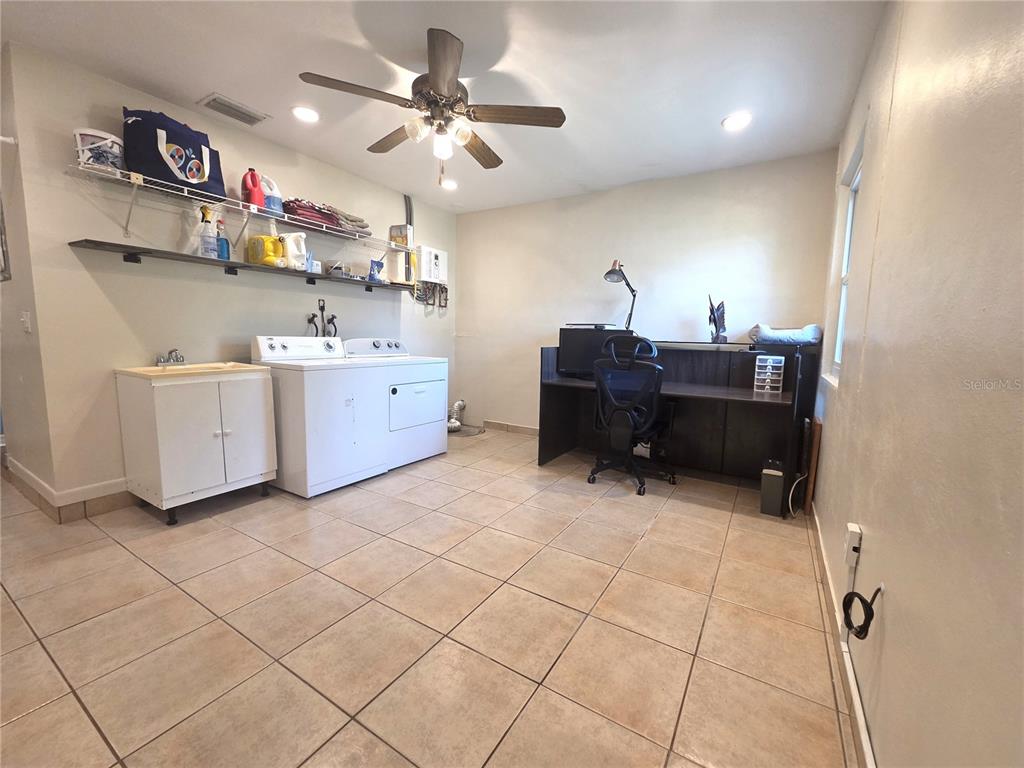 4059 Ligonier Road Spring Hill, FL 34608 - Photo 23 of 36 a view of a workspace with furniture