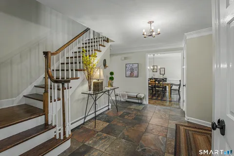 a view of entryway livingroom and hall