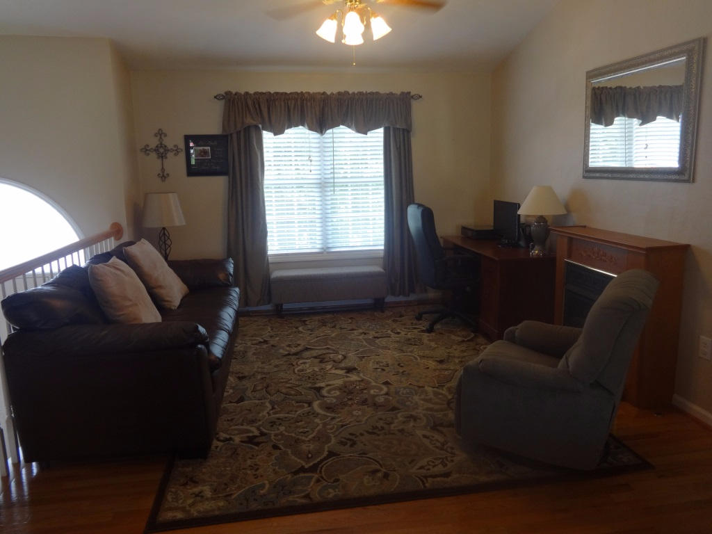 1732 Meadows Road Vinton, VA 24179 - Photo 12 of 32 a living room with furniture and a window