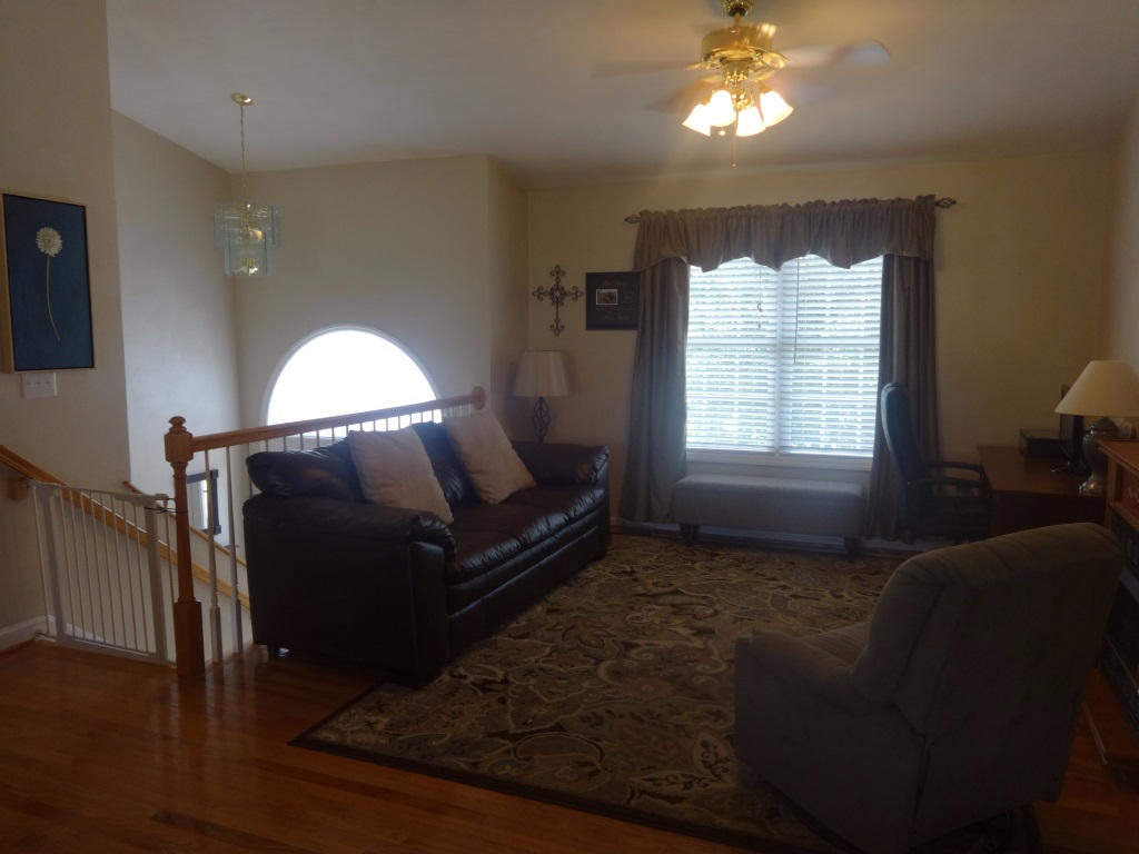 1732 Meadows Road Vinton, VA 24179 - Photo 13 of 32 a living room with furniture and a window