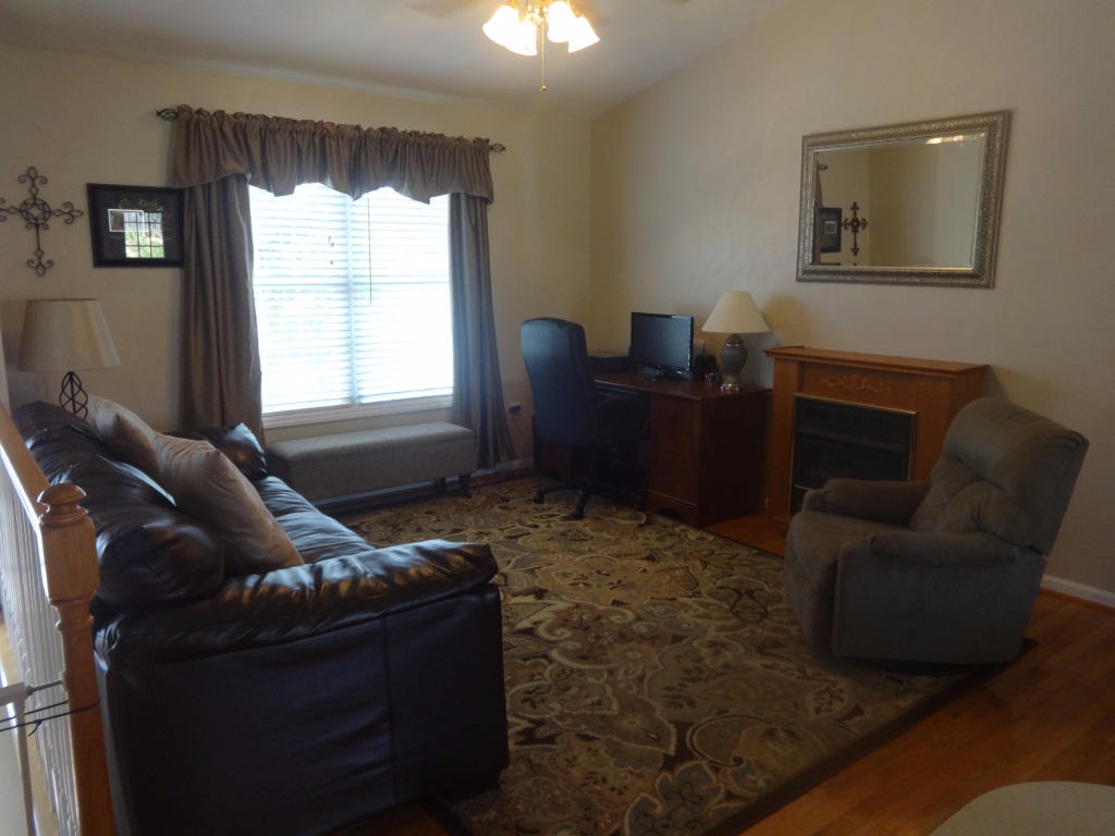 1732 Meadows Road Vinton, VA 24179 - Photo 14 of 32 a living room with furniture and a window