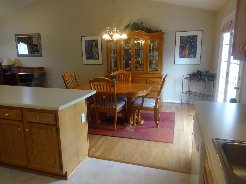 1732 Meadows Road Vinton, VA 24179 - Photo 19 of 32 a view of a dining room with furniture and wooden floor