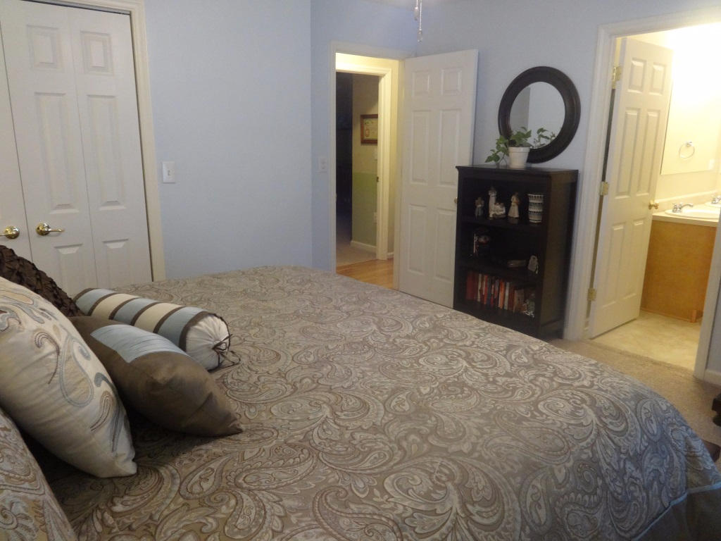 1732 Meadows Road Vinton, VA 24179 - Photo 25 of 32 a bedroom with a bed and a dresser