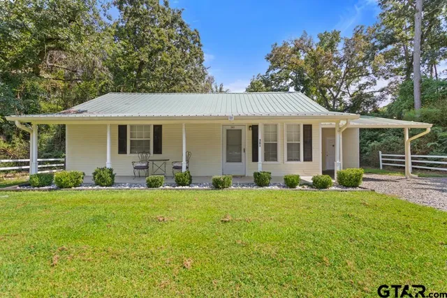 front view of a house and a yard