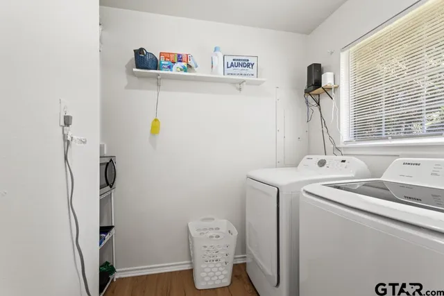 a utility room with dryer and washer