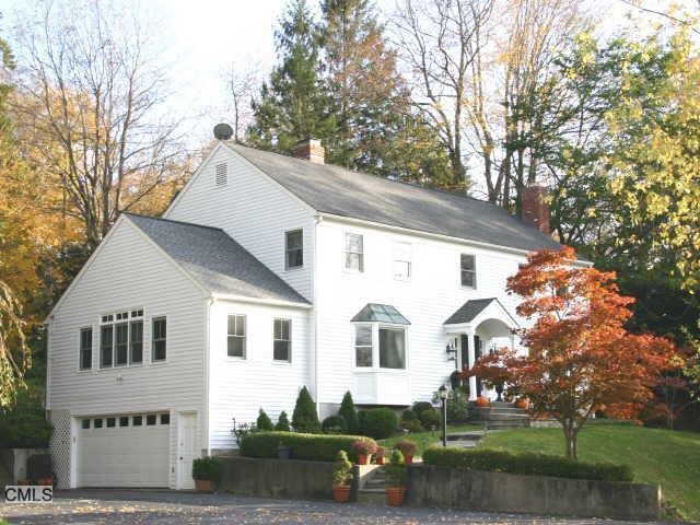 48 Branchville Road Ridgefield, CT 06877 - Photo 1 of 1 a view of white house with a yard