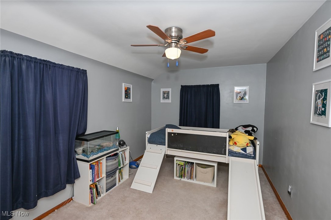 4940 Westbourne Road Cleveland, OH 44124 - Photo 17 of 26 Bedroom with carpet floors and ceiling fan