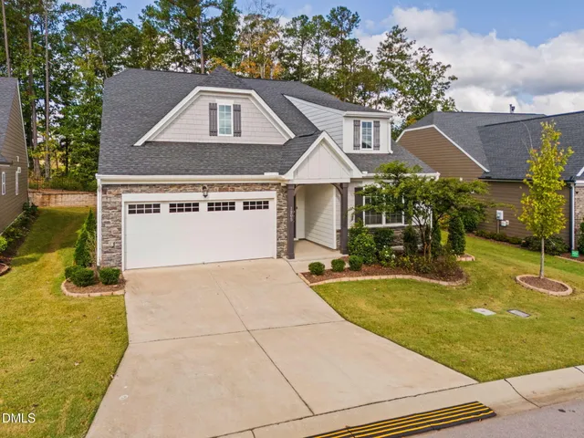 a front view of a house with swimming pool