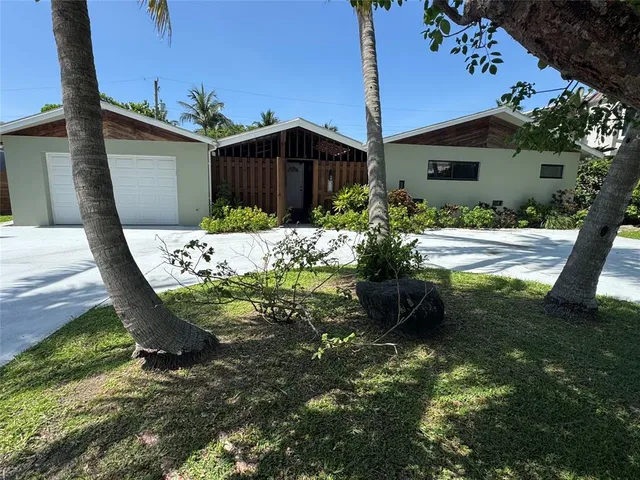 a view of a backyard with garden
